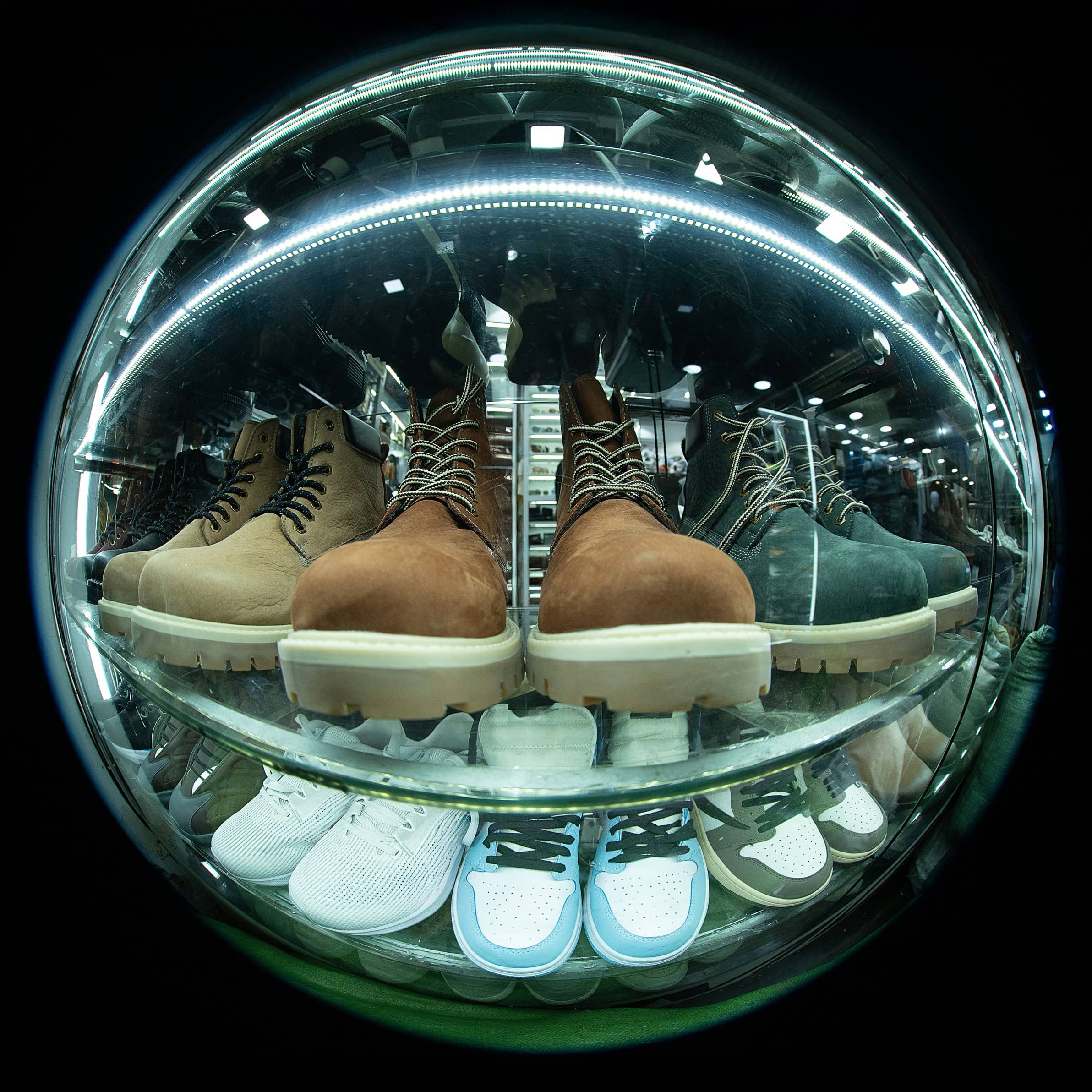 Boots and sneakers on display